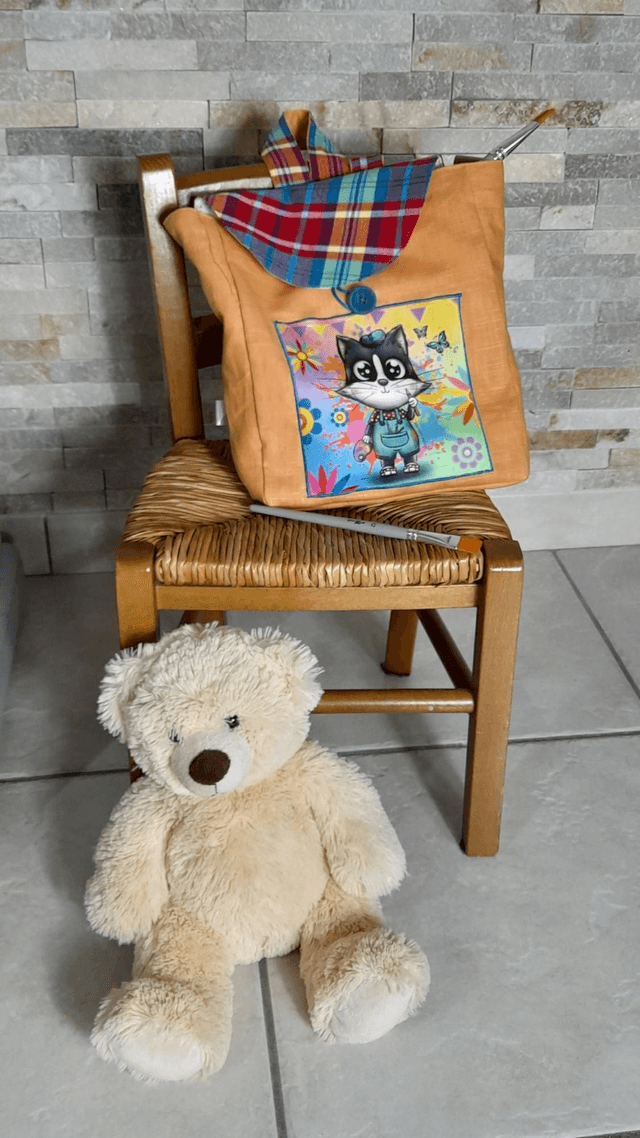 Sac à Dos illustré orange et carreaux 