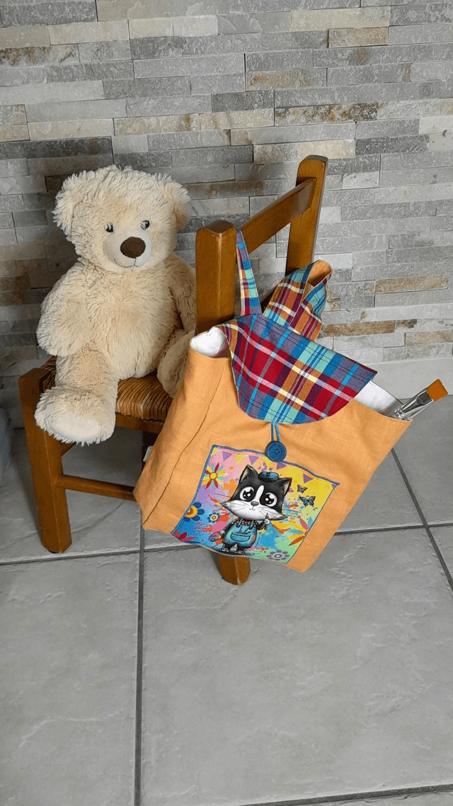 Sac à Dos illustré orange et carreaux 